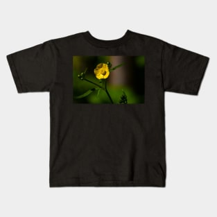 Closeup of a bright yellow buttercup Kids T-Shirt